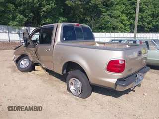 2001 Ford F-150 XLT with VIN 1FTRW07W11KD96140, listed as a IAAI auction lot 42331842 with Not provided miles and . Bid and sale history available at DreamBid. Image 3.