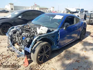 2014 Subaru BRZ Limited with VIN JF1ZCAC11E8602767, listed as a IAAI auction lot 41520227 with 117,311 mi miles. Bid and sale history available at carsss.com. Image 2.