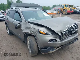 2017 Jeep Cherokee Latitude with VIN 1C4PJMCB3HW657318, listed as a IAAI auction lot 42429044 with 133,335 mi miles and . Bid and sale history available at DreamBid. Image 6.