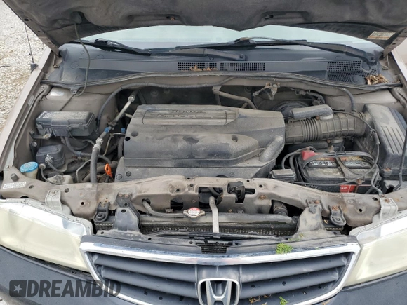 2003 Honda Odyssey EX z VIN 5FNRL186X3B152340, wystawiony jako Copart lot #57883455 z przebiegiem 214 008 mil mil oraz Szkoda całkowita • Salvage title. Historia ofert i sprzedaży dostępna na DreamBid. Obrazek 12.