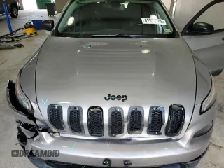 2017 Jeep Cherokee Altitude with VIN 1C4PJLABXHW586048, listed as a Copart auction lot 62674745 with 106,334 mi miles and Salvage title. Bid and sale history available at DreamBid. Image 12.