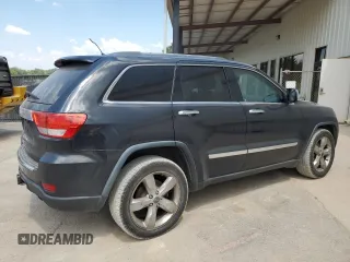 2013 Jeep Grand Cherokee Overland with VIN 1C4RJECT7DC526119, listed as a Copart auction lot 60735594 with 143,454 mi miles and Clean Title. Bid and sale history available at carsss.com. Image 3.