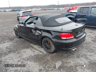 2011 BMW 1 Series 128i with VIN WBAUN1C5XBVH82457, listed as a IAAI auction lot 41173785 with Not provided miles and . Bid and sale history available at DreamBid. Image 3.