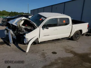2023 Toyota Tacoma SR z VIN 3TYCZ5AN9PT121423, wystawiony jako Copart lot #52863105 z przebiegiem Nie podano mil oraz Nie do naprawy • Non repairable. Historia ofert i sprzedaży dostępna na DreamBid. Obrazek 1.