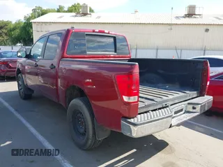 2013 Nissan Titan XE with VIN 1N6AA0EJ3DN308045, listed as a IAAI auction lot 42136642 with 149,750 mi miles. Bid and sale history available at carsss.com. Image 3.