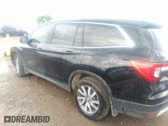 2021 Honda Pilot EX-L with VIN 5FNYF5H50MB011165, listed as a IAAI auction lot 39799892 with 95,040 mi miles and . Bid and sale history available at DreamBid. Image 14.