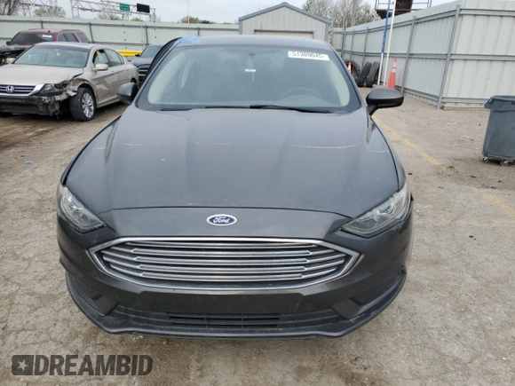 2017 Ford Fusion SE z VIN 3FA6P0H76HR137923, wystawiony jako Copart lot #51309045 z przebiegiem 171 056 mil mil oraz Szkoda całkowita • Salvage title. Historia ofert i sprzedaży dostępna na DreamBid. Obrazek 5.