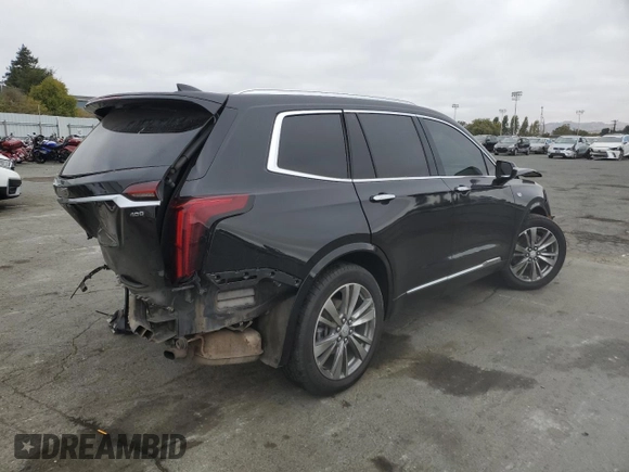 2022 Cadillac XT6 Premium Luxury with VIN 1GYKPDRS5NZ110989, listed as a Copart auction lot 69600894 with 56,148 mi miles and Salvage Title. Bid and sale history available at carsss.com. Image 3.