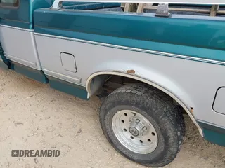 1996 Ford F-150 with VIN 1FTEX15N1TKA11657, listed as a IAAI auction lot 42076737 with 114,816 mi miles and . Bid and sale history available at DreamBid. Image 6.