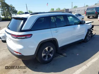 2022 Jeep Grand Cherokee with VIN 1C4RJYB66N8718018, listed as a IAAI auction lot 42002051 with Not provided miles and . Bid and sale history available at DreamBid. Image 4.