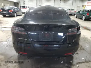 2016 Tesla Model S 70 with VIN 5YJSA1E13GF157708, listed as a Copart auction lot 57911925 with 131,606 mi miles and Clean title. Bid and sale history available at DreamBid. Image 6.