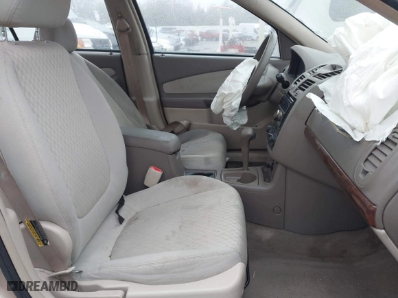 2004 Chevrolet Malibu with VIN 1G1ZS52F94F198783, listed as a IAAI auction lot 41453230 with 127,397 mi miles. Bid and sale history available at carsss.com. Image 5.