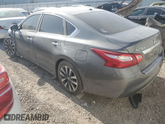 2016 Nissan Altima SV with VIN 1N4AL3AP0GC246165, listed as a Copart auction lot 52843405 with 106,396 mi miles and Salvage title. Bid and sale history available at DreamBid. Image 2.