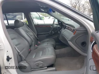 2003 Cadillac DeVille z VIN 1G6KD54Y13U208351, wystawiony jako IAAI lot #41889713 z przebiegiem 132 774 mil mil oraz . Historia ofert i sprzedaży dostępna na DreamBid. Obrazek 5.