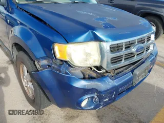 2008 Ford Escape XLT z VIN 1FMCU03158KD31562, wystawiony jako IAAI lot #42319652 z przebiegiem 123 926 mil mil oraz . Historia ofert i sprzedaży dostępna na DreamBid. Obrazek 6.
