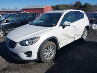 2016 Mazda CX-5 Touring with VIN JM3KE4CYXG0917841, listed as a IAAI auction lot 41420641 with 75,710 mi miles. Bid and sale history available at carsss.com. Image 17.
