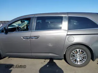 2011 Honda Odyssey EX-L with VIN 5FNRL5H6XBB083980, listed as a IAAI auction lot 42100308 with 191,361 mi miles and . Bid and sale history available at carsss.com. Image 14.