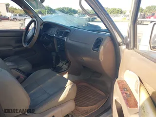 1997 Toyota 4Runner Limited with VIN JT3GN87R3V0043679, listed as a IAAI auction lot 42043029 with 296,834 mi miles. Bid and sale history available at carsss.com. Image 5.