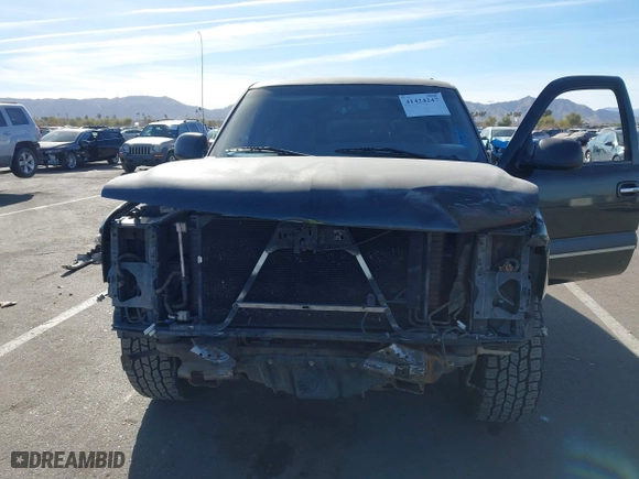 2003 Chevrolet Tahoe LS with VIN 1GNEC13V03R112315, listed as a IAAI auction lot 41424247 with 256,017 mi miles. Bid and sale history available at carsss.com. Image 6.