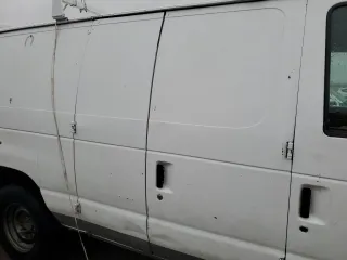 2009 Ford Econoline Cargo Commercial with VIN 1FTSS34L79DA03928, listed as a Copart auction lot 86367804 with 205,360 mi miles and Salvage Title. Bid and sale history available at carsss.com. Image 11.