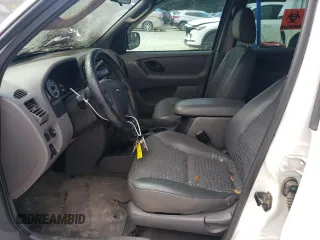 2002 Ford Escape XLS Choice with VIN 1FMYU011X2KB24469, listed as a Copart auction lot 76462504 with Not provided miles and Salvage title. Bid and sale history available at DreamBid. Image 7.