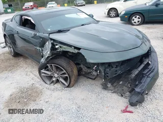 2020 Chevrolet Camaro 1LT with VIN 1G1FB1RS6L0125323, listed as a IAAI auction lot 42101034 with 124,474 mi miles and . Bid and sale history available at DreamBid. Image 1.