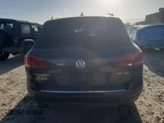 2012 Volkswagen Touareg Sport z VIN WVGFK9BP6CD001309, wystawiony jako Copart lot #52827875 z przebiegiem 153 250 mil mil oraz Czysty tytuł • Clean title. Historia ofert i sprzedaży dostępna na DreamBid. Obrazek 6.