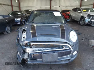 2014 MINI Hardtop S z VIN WMWXM7C50ET731680, wystawiony jako IAAI lot #41691317 z przebiegiem 47 205 mil mil oraz . Historia ofert i sprzedaży dostępna na DreamBid. Obrazek 12.