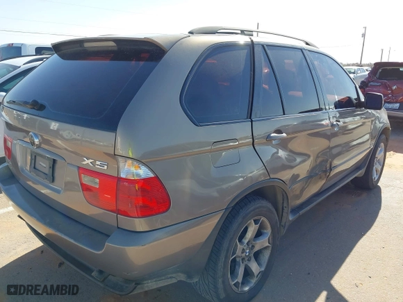 2005 BMW X5 3.0i with VIN 5UXFA13585LY02191, listed as a IAAI auction lot 41972273 with 179,816 mi miles. Bid and sale history available at carsss.com. Image 4.