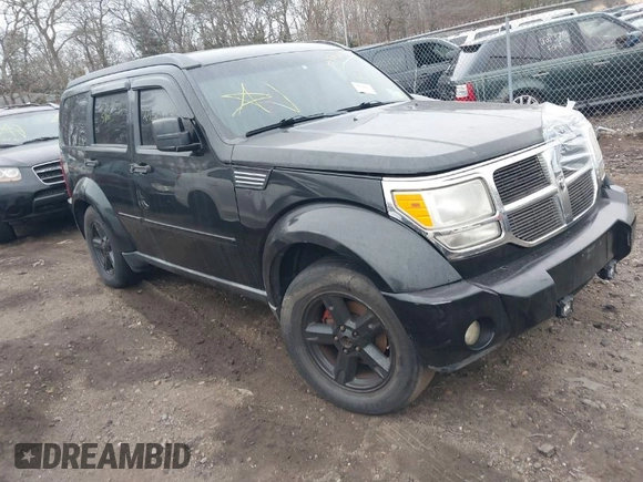 2009 Dodge Nitro SLT with VIN 1D8GU58K19W525618, listed as a IAAI auction lot 41726192 with 999,999 mi miles. Bid and sale history available at carsss.com. Image 1.