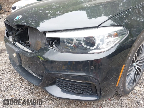 2018 BMW 5 Series 540i xDrive with VIN WBAJE7C58JG891098, listed as a IAAI auction lot 42331320 with 55,172 mi miles and . Bid and sale history available at DreamBid. Image 21.