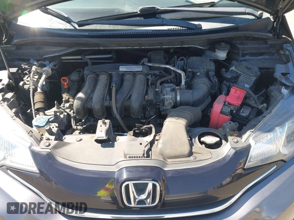 2015 Honda Fit EX-L z VIN 3HGGK5H86FM746265, wystawiony jako IAAI lot #42253205 z przebiegiem 75 491 mil mil oraz . Historia ofert i sprzedaży dostępna na DreamBid. Obrazek 10.