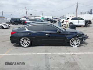 2014 Infiniti Q50 Premium z VIN JN1BV7AP3EM690571, wystawiony jako IAAI lot #42136354 z przebiegiem 191 969 mil mil oraz . Historia ofert i sprzedaży dostępna na DreamBid. Obrazek 13.