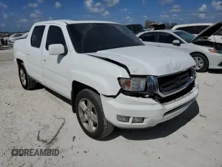 2010 Honda Ridgeline RTL with VIN 5FPYK1F51AB011041, listed as a Copart auction lot 77210844 with 81,265 mi miles and Salvage Title. Bid and sale history available at carsss.com. Image 4.