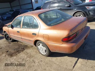 1997 Geo Prizm z VIN 1Y1SK5268VZ443044, wystawiony jako IAAI lot #41705020 z przebiegiem 94 840 mil mil oraz . Historia ofert i sprzedaży dostępna na DreamBid. Obrazek 3.