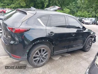 2018 Mazda CX-5 Grand Touring with VIN JM3KFBDM2J0400828, listed as a IAAI auction lot 42540846 with 254,672 mi miles and . Bid and sale history available at DreamBid. Image 13.