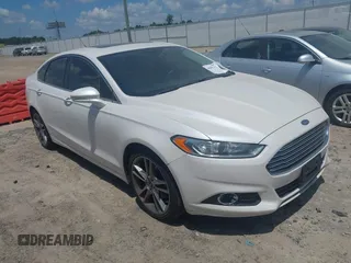 2016 Ford Fusion Titanium z VIN 3FA6P0K97GR337461, wystawiony jako IAAI lot #42832312 z przebiegiem 216 357 mil mil oraz . Historia ofert i sprzedaży dostępna na DreamBid. Obrazek 1.