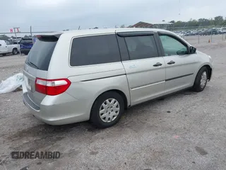 2006 Honda Odyssey LX with VIN 5FNRL38206B129663, listed as a IAAI auction lot 40978284 with 290,666 mi miles. Bid and sale history available at carsss.com. Image 4.