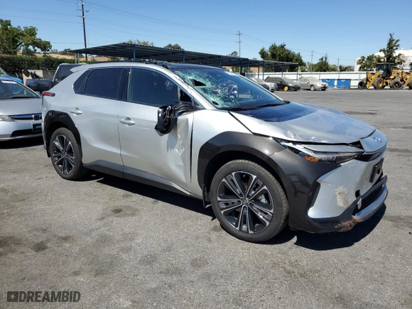 2023 Toyota bZ4X XLE with VIN JTMABACA8PA029307, listed as a Copart auction lot 71105754 with 24,208 mi miles and Salvage Title. Bid and sale history available at carsss.com. Image 4.