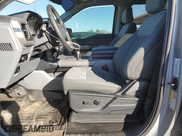 2023 Ford F-150 XL with VIN 1FTFW1E81PKG15779, listed as a Copart auction lot 46870415 with 15,691 mi miles and Salvage Title. Bid and sale history available at carsss.com. Image 7.