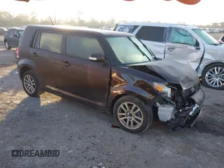 2010 Scion xB with VIN JTLZE4FE8A1103590, listed as a IAAI auction lot 41247385 with 233,182 mi miles and . Bid and sale history available at DreamBid. Image 1.