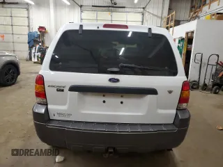 2006 Ford Escape XLT with VIN 1FMCU03106KC14923, listed as a Copart auction lot 52727095 with 126,842 mi miles and Salvage Title. Bid and sale history available at DreamBid. Image 6.