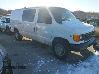2003 Ford Econoline Cargo Commercial with VIN 1FTNE24L23HA66109, listed as a IAAI auction lot 41218259 with 240,390 mi miles and . Bid and sale history available at carsss.com. Image 1.