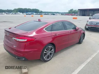2019 Ford Fusion Titanium с VIN 3FA6P0D96KR152789, выставлен на аукционе IAAI как лот 42523192 с пробегом Не указан миль и . История ставок и продаж доступна на DreamBid. Изображение 4.