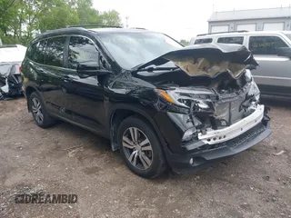 2018 Honda Pilot EX-L with VIN 5FNYF6H53JB009282, listed as a IAAI auction lot 42331361 with 98,127 mi miles and . Bid and sale history available at DreamBid. Image 1.
