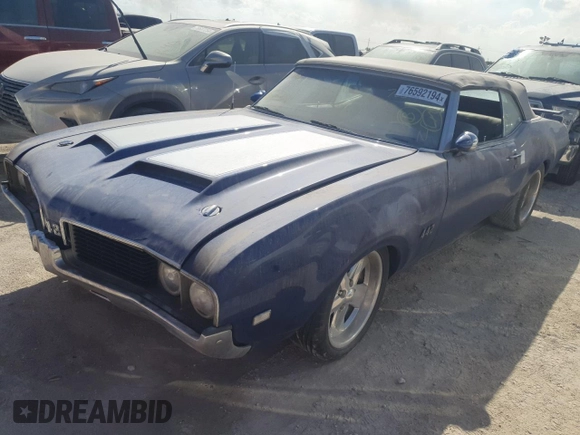 1969 Oldsmobile Cutlass with VIN 336679M283424, listed as a Copart auction lot 76592194 with Not Provided miles and Salvage Title. Bid and sale history available at DreamBid. Image 1.
