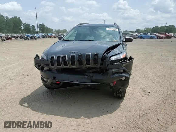 2016 Jeep Cherokee Trailhawk z VIN 1C4PJMBS5GW179273, wystawiony jako Copart lot #61175695 z przebiegiem 110 295 mil mil oraz Czysty tytuł • Clean title. Historia ofert i sprzedaży dostępna na DreamBid. Obrazek 14.