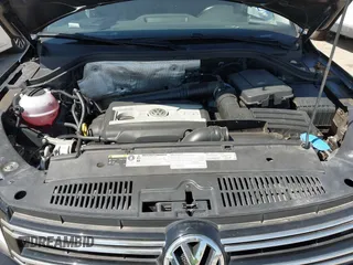 2015 Volkswagen Tiguan SE with VIN WVGAV7AX1FW558855, listed as a IAAI auction lot 42064427 with 58,584 mi miles and . Bid and sale history available at DreamBid. Image 10.