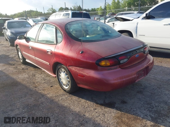1996 Ford Taurus LX with VIN 1FALP53S2TA311839, listed as a IAAI auction lot 42171689 with 150,116 mi miles and . Bid and sale history available at DreamBid. Image 3.