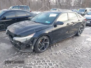 2023 Hyundai Elantra N Line z VIN KMHLR4AF9PU526879, wystawiony jako IAAI lot #41640771 z przebiegiem 51 446 mil mil oraz . Historia ofert i sprzedaży dostępna na DreamBid. Obrazek 17.